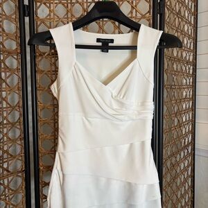 White House Black Market top with a side zipper. Pleats create a slimming effect